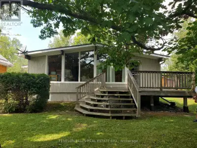 Four-Season cottage near mouth of canal to Sturgeon Lake. Lovely views of lake. 768 sq. ft home plus...