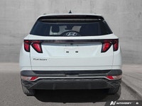 This Tucson comes with; Rear Defrost, Front Wheel Drive, Power Door Locks, Brake Assist, Power Steer... (image 5)