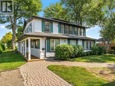 WELCOME TO THIS RARE OPPORTUNITY TO OWN A LUXURIOUS WATERFRONT HOME IN THE HEART OF TECUMSEH! Situat...