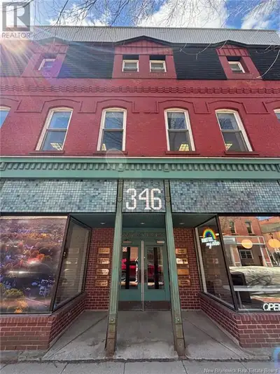 Well established professional office building, The Brayley House. Centrally located in downtown Fred...
