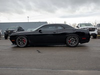This 2016 Dodge Challenger R/T is powered by a classic 5.7L HEMI V8 engine paired with a smooth auto... (image 4)