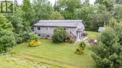 GREAT COUNTRY PROPERTY WITH CITY WATER! This fabulous bi level is spacious and offers a main floor o...