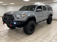 Built to outwork expectations and outplay the weekend, this 2021 Toyota Tacoma in Cement proves capa... (image 1)