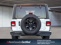 The 2024 Jeep Wrangler Sport in brilliant Bright White, with a mere 33,121 kilometers, is your ticke... (image 5)