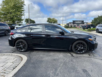 Experience the thrill of the 2025 Honda Civic Hatchback Sport, boasting a sleek Crystal Black Pearl... (image 3)