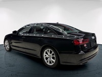 The 2018 Audi A6 Progressiv in stunning black with an AWD drive train offers you a solid and confide... (image 4)