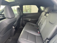 Curbside, this 2026 Lexus RX350h Premium expresses its sophisticated style with a sleek body design... (image 7)