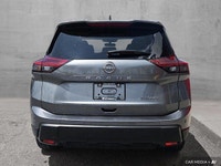 This AWD Rogue features a turbocharged engine, heated front seats, heated steering wheel, and a pano... (image 5)