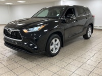 The citys lights ripple across wet pavement as the Midnight Black Metallic finish glides past, its L... (image 1)