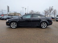 This pre-owned 2008 Audi A4 2.0T offers a timeless design with a sleek black exterior paired with a... (image 2)