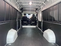 The 2025 Ram ProMaster Cargo Van in a clean white finish, equipped with front-wheel drive, is design... (image 5)