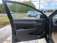 A practical compact sedan with efficient performance, modern convenience features, and a comfortable... (image 6)