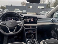 This 2025 Volkswagen Taos Comfortline, with a mere 12,750 kilometers, offers a harmonious blend of r... (image 9)