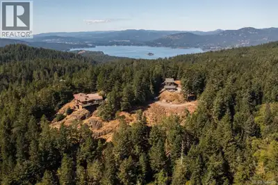 Exquisite acreage with expansive OCEAN and MOUNTAIN VIEWS! 3.81-acre building lot on Mt. Matheson in...