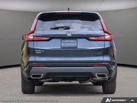 The 2026 Honda CR-V Hybrid EX-L AWD in a striking Blue finish offers both power and precision with i... (image 4)