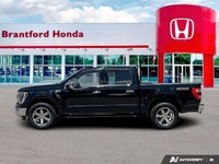 Elevate your capability and comfort with this remarkable 2022 Ford F-150 LARIAT Crew Cab Pickup. Dre... (image 1)