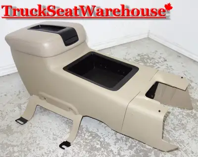 call or text 905-259-8027 or email truckseatwarehouse@gmail.com Tan plastic storage console from a 2...