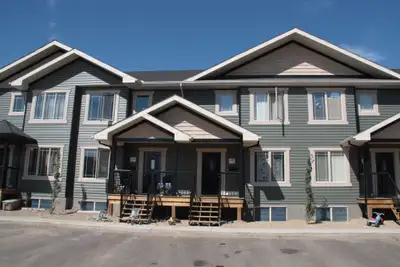 This three-bedroom townhouse in Wallace Point boasts an open concept main floor, upgradeed flooring...