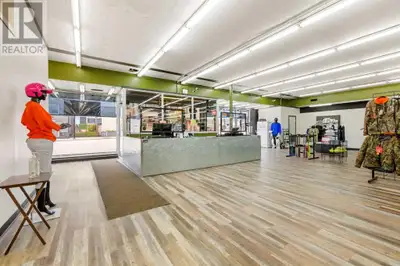 This versatile commercial building offers 8142 square feet of prime lease space on the main level, l...