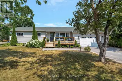 PERFECT BLEND OF COTTAGE CHARM & FAMILY LIVING - Discover this thoughtfully updated bungalow with mo...