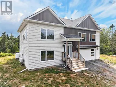 Welcome to this beautifully maintained executive split entry, only three years old and situated on a...