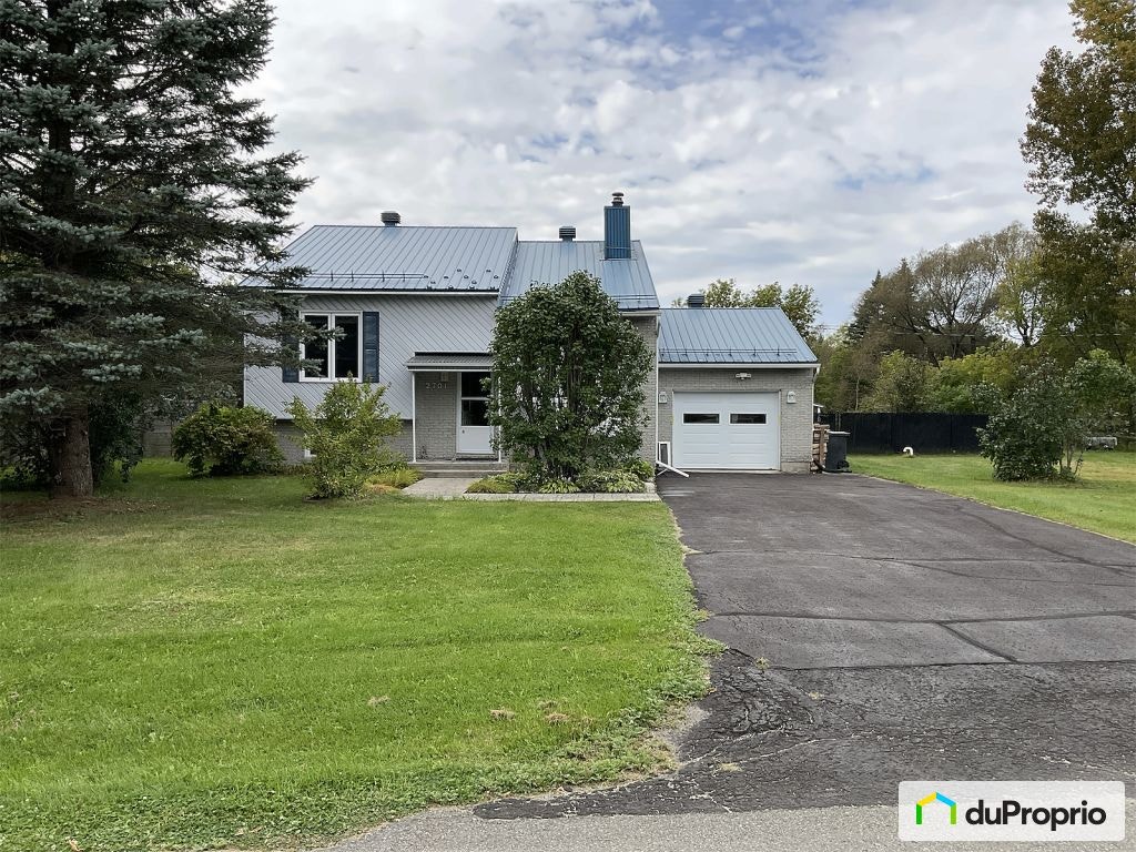 $559,000 - Bungalow for sale in L'Assomption — photo 1
