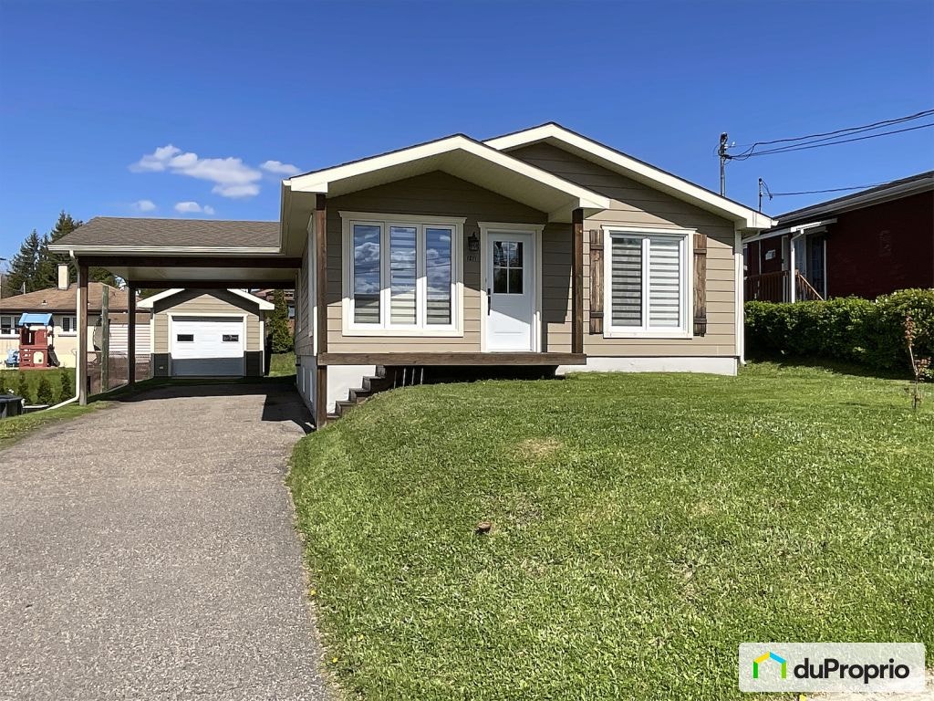 $390,000 - Bungalow for sale in La Baie — photo 1