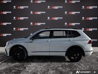 Check out this 2024 Volkswagen Tiguan Comfortline R-Line Black Edition before someone takes it home!... (image 1)