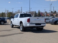 This pre-owned 2025 Ram 3500 Limited Longhorn Crew Cab is finished in Bright White with a distinctiv... (image 3)