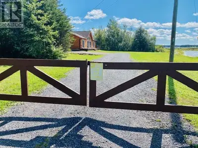 Lovely waterfront furnished turnkey move-in ready year around 4 yr. old Log Home offering beautiful...