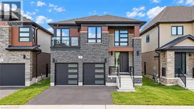 YOUR NEAR-NEW DREAM HOME AWAITS: Welcome to 31 Jacob Detweiller Drive, a stunning contemporary home...