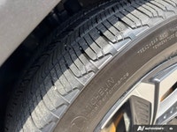 Seamlessly blend eco-consciousness with sophisticated design in this 2023 Hyundai Tucson Hybrid Luxu... (image 9)