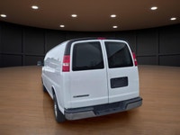 The 2020 Chevrolet Express Cargo Van 2500 Extended Wheelbase in a clean White finish, paired with re... (image 6)
