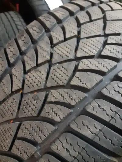 IF U SEE THE AD, TIRES STILL FOR SALE 2 x 245/45/18 DUNLOP spwinter WINTER tires 90 % tread left 10/...