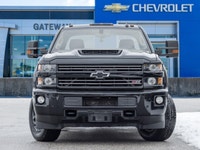 The 2017 Chevrolet Silverado 2500HD LT commands attention with a rugged, purposeful silhouette that... (image 1)