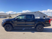This Ford Ranger has a durable Turbo Gas 4cyl 2.3 L engine powering this Automatic transmission. Dea... (image 9)