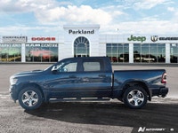 This 2020 Ram 1500 Sport stands out in *Patriot Blue Pearl*, powered by the legendary *5.7L HEMI V8*... (image 1)