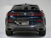 This 2020 BMW X6 M50i Coupe commands attention with aggressive styling, a powerful V8 engine, and re... (image 6)