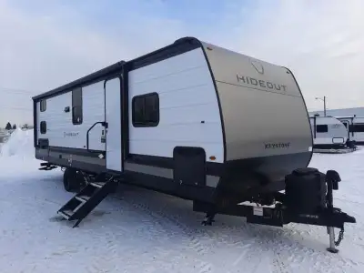 Keystone Hideout travel trailer 262BHS highlights: Front Private Bedroom 20' Power Awning with LED L...