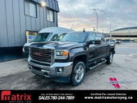 The 2016 GMC Sierra 2500HD 4WD Crew Cab 153.7in. SLT is a heavy-duty pickup truck with a standard 6.... (image 1)