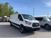 Focused on utility and economy, this Ford Transit is a strong contender in the work van market. This... (image 2)