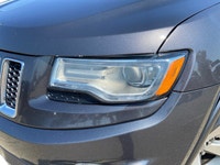 This Jeep Grand Cherokee has a dependable Regular Unleaded V-8 5.7 L/345 engine powering this Automa... (image 8)