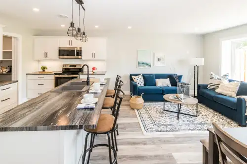 Modern, bright, and thoughtfully designed 2-bedroom, 2-bath townhome-style unit available at The Mea...