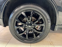 Experience the bold presence and versatility of the 2019 Dodge Durango GT in striking black with an... (image 6)