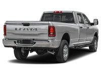 Experience the impressive 2026 Ram 3500 Laramie, a stunning Silver truck equipped with a robust 4x4... (image 1)