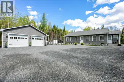 Nearly new quality-built bungalow situated on over an acre of land with a private backyard and gated...
