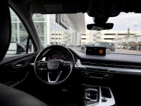 The 2019 Q7 is a mid-size luxury SUV known for its car-like handling, high-quality interior material... (image 9)