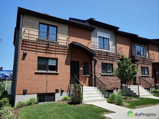 $599,998 - Townhouse for sale in Candiac — photo 1