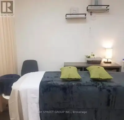 Lakeshore Trophy Location - High-Profit 3-Bed RMT Clinic.Rare opportunity to own a high-visibility,...