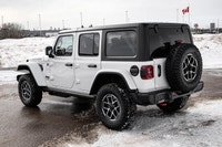 This Jeep Wrangler has a strong Regular Unleaded V-6 3.6 L/220 engine powering this Automatic transm... (image 1)